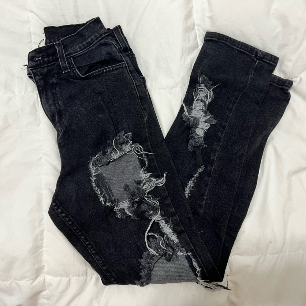 Black (1 W24) ripped skinny jeans! Never worn. No tags.